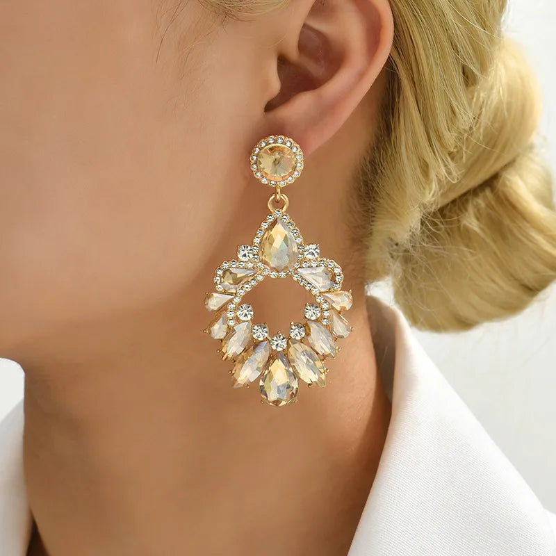 Boucles d’oreilles glamour dorées cristaux champagne