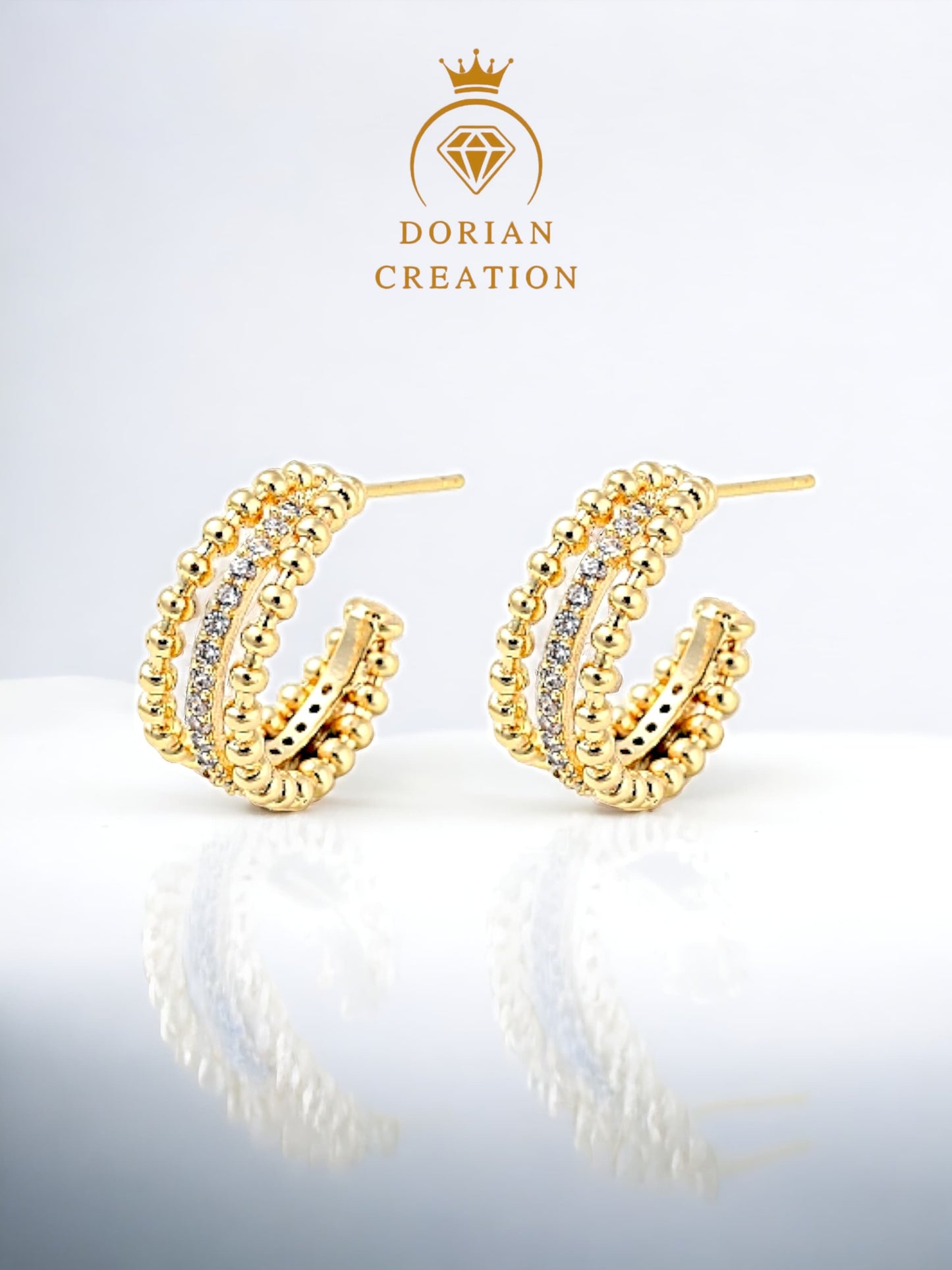 Boucles d'oreilles style créole 3 bandes baignée dans l'or 18 carats