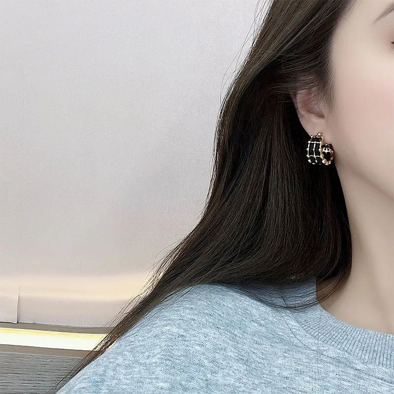 Boucles d'oreilles Cristal Géométriques – Noir & Doré