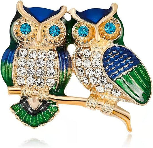Broche hiboux duo sur branche – strass & émail coloré