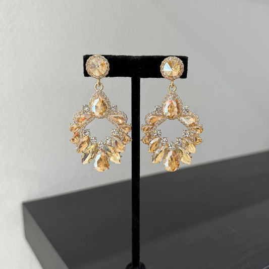 Boucles d’oreilles glamour dorées cristaux champagne