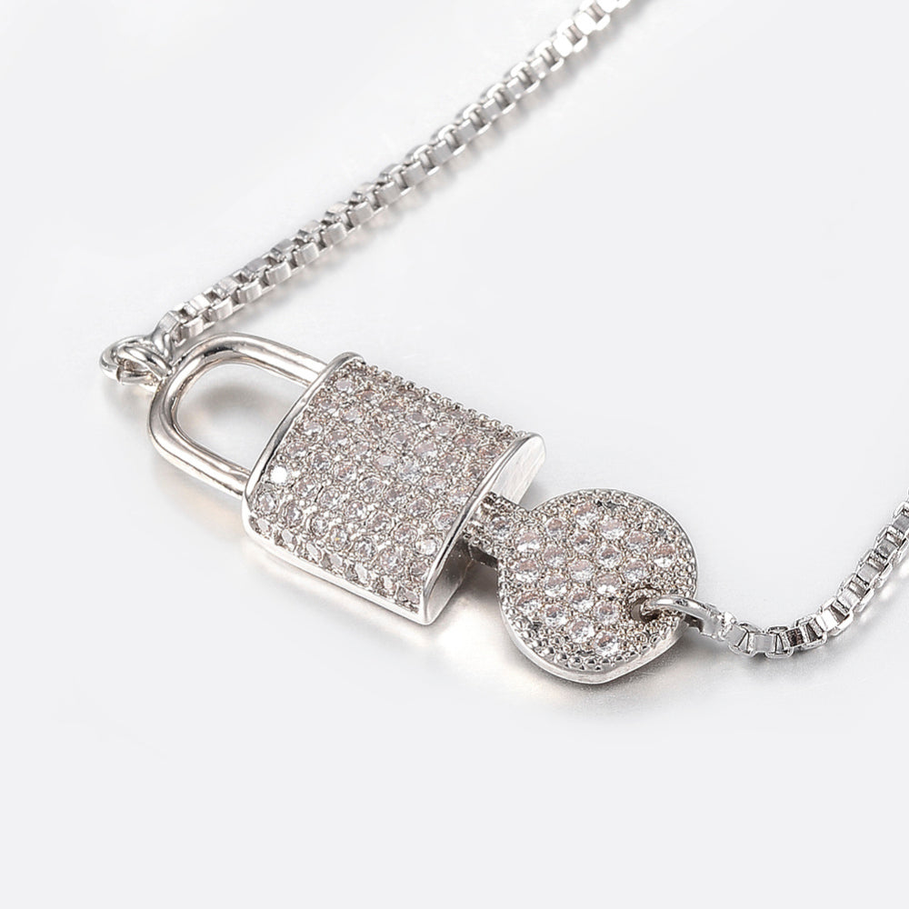 Bracelet cadenas & clé – argenté serti de zircons